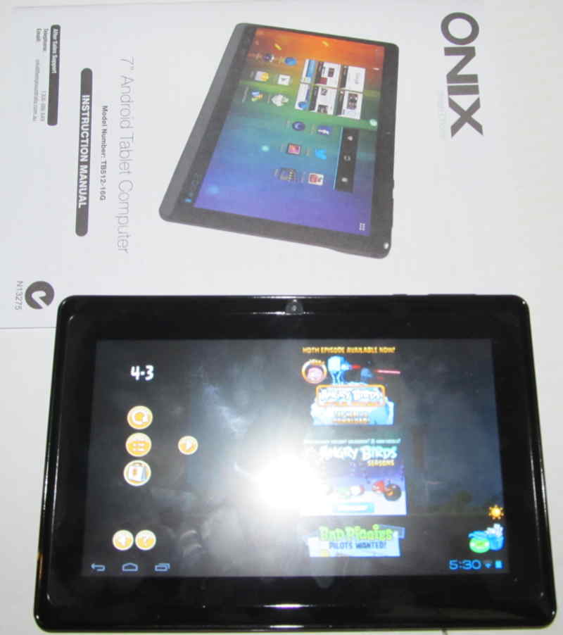 front of the onix 7 inch tablet and cover of manual